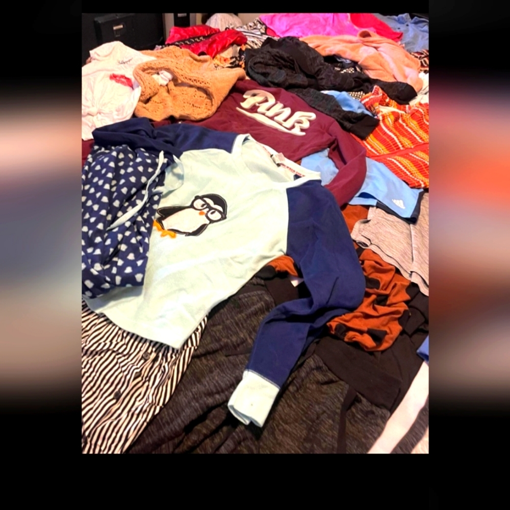 Variety of womens small and medium clothes. Men's large.